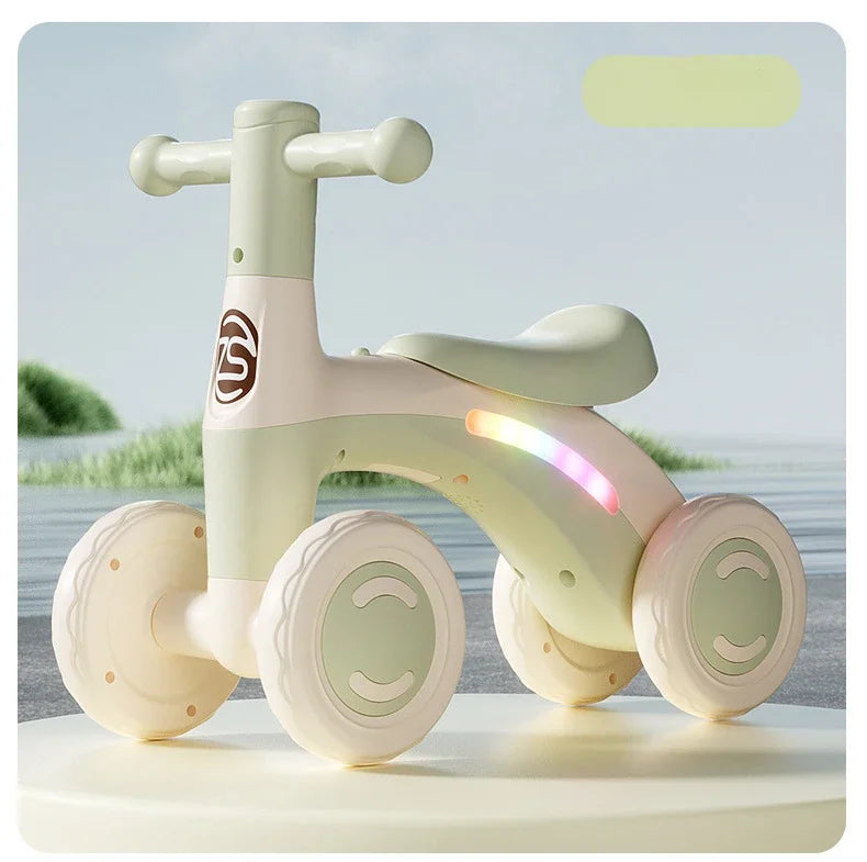 Anti-Tip Baby Balance Bike Ages 1-3 4-Wheel Silent Glider Walker Toy Toddler Training Ride-On with Safety Wheels Indoor Outdoor